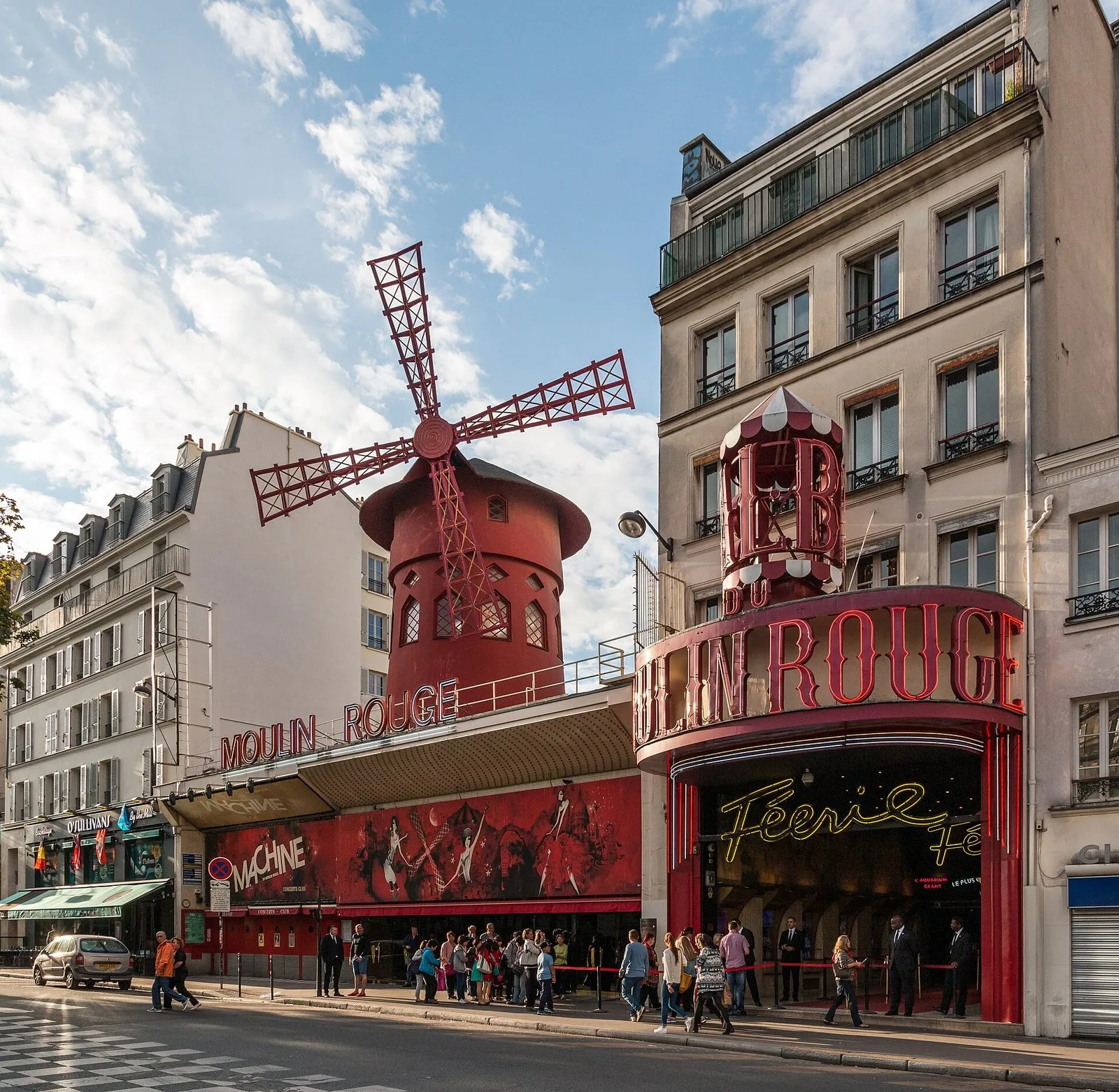 The Moulin Rouge on boulevard de Clichy, with its red windmill on the roof